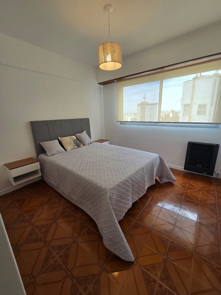 2 AMBIENTES CON BALCON AL FRENTE Y COCHERA EN PISO ALTO